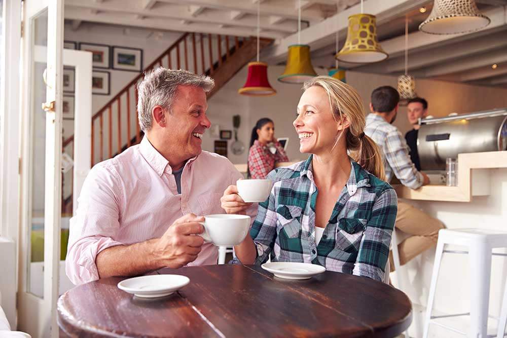 Copy of Man-and-Woman-on-Date A man and woman are on a date and enjoying their smiles. The woman has porcelain veneers.